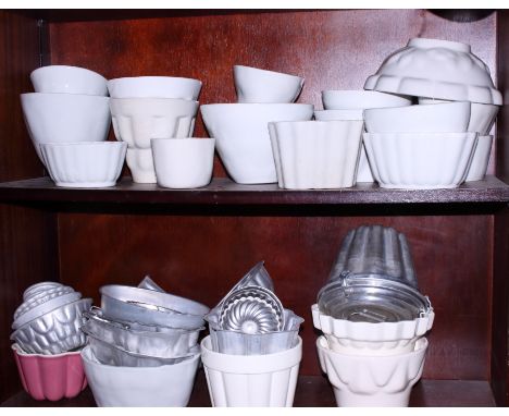 A quantity of ceramic and tin jelly moulds, various sizes and designs