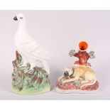 A 19th century Staffordshire spill vase with mastiff, 6" high, and a 19th century Staffordshire