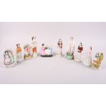 A 19th century Staffordshire figure, Faith, 4 1/2" high, and nine other similar Staffordshire