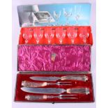 A stag's horn carving set, in box, and six Chaumont wine glasses