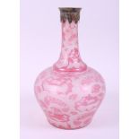 A Bohemian flashed and engraved glass decanter with metal mounts, 9" high