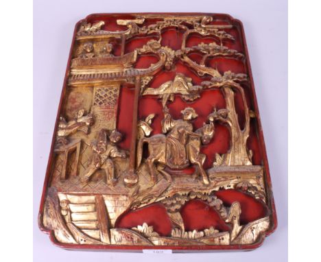 A Chinese red lacquered and gilt carved wood bed panel, decorated figures and buildings, 17" x 13"