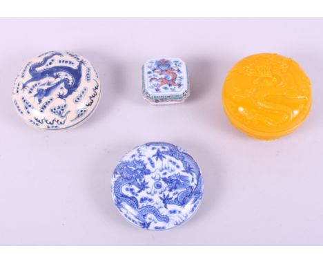 A Chinese yellow Peking glass paste pot, decorated dragon seal mark to base, a Chinese blue and white porcelain paste pot, de