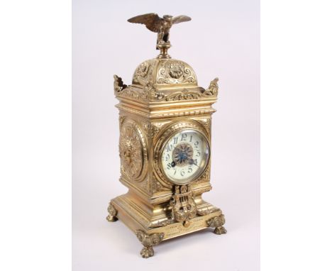 A late 19th century Renaissance Revival brass cased mantel clock with eagle surmount, 16" high