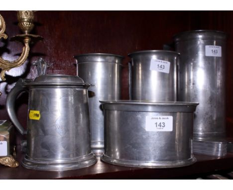 Three Portuguese pewter measures, a pewter oval box and cover, a lidded tankard and two pewter snuff boxes