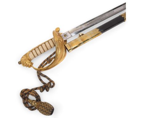 An early 20th century Naval Officer's sword with chamois leather sleeve, and leather carrying case marked J.S. Seal, RNR, len