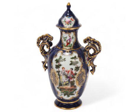 A Worcester blue and gilt porcelain vase and cover, with elaborate scrolled handles, overall height 34cmKnop has been profess