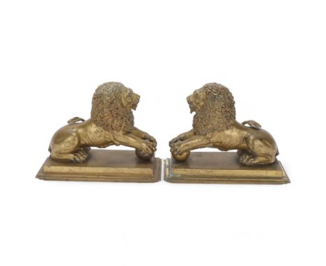 Pair of early 19th century bronze heraldic lions, on stepped bronze bases, length 21cm, height 17cm 