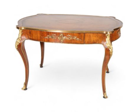 A French walnut library table, early to mid-20th century, with shaped top, single frieze drawer on cabriole legs, with allove