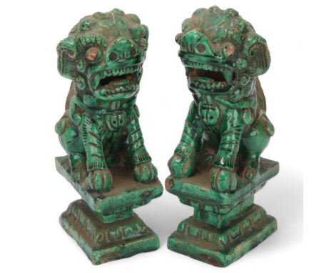 Pair of Chinese green glaze pottery dogs of fo, height 21cm 