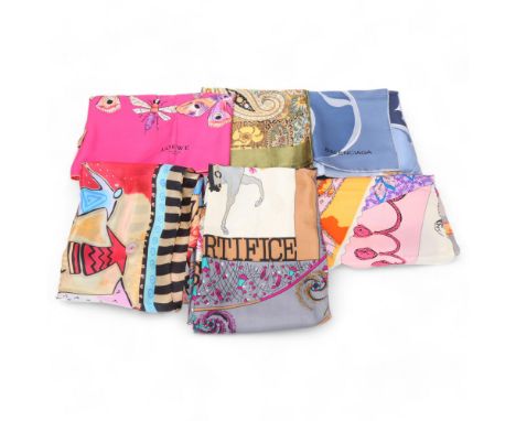 A collection of 7 silk ladies scarves, including Hermes, Paris, Lowe, Madrid, Picasso scarf and BalenciagaAll in good conditi