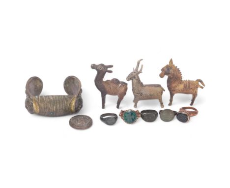 A group of miniature African bronze animal design gold weights, Ancient bronze rings, and other interesting items 