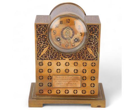 A Jugendstil Art Nouveau mantel clock, circa 1910, brass inlaid mahogany case probably by Erhard & Zohne, inset brass plaque 