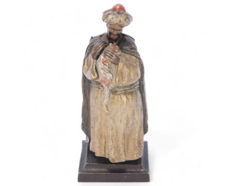 Austrian cold painted erotic bronze figure, in the form of an Arab man with hinged opening cloak, no factory marks, height 13