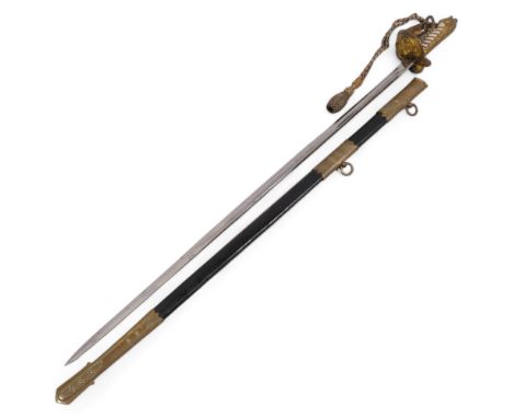 A George VI Naval Officer's sword, with gilt-bronze mounts  and leather sheath and faux shagreen handle, etched blade with ma