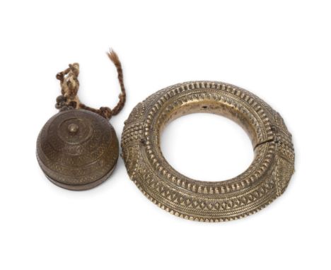 A heavy cast-bronze 2-section slave bangle, diameter 15cm, and an 18th century bronze ball-shaped box, diameter 6.5cm (2) 