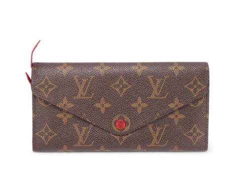 A Louis Vuitton Sarah wallet, in brown monogram leather, with red leather covered leather and interior, with box, papers, dus
