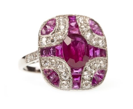 ART DECO STYLE RUBY AND DIAMOND RING, the cushion shaped bezel set with oval and calibre cut rubies, interspaced by round bri