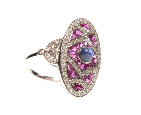 RUBY, SAPPHIRE AND DIAMOND RING, the elongated bezel set with a cabochon sapphire, calibre cut rubies and round brilliant cut