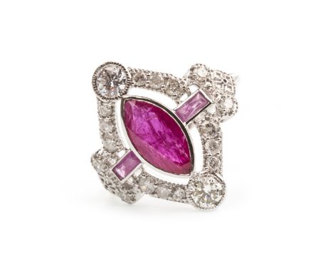 RUBY AND DIAMOND DRESS RING, the central marquise ruby flanked by two baguette cut rubies to either side, within a round bril