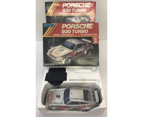 3 boxed vintage Radcon battery operated remote controlled Porsche 930 Turbo cars. 1/15 scale, item #5517, made in Hong Kong.