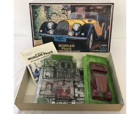 A 1:16 scale Morgan Plus 8 model car kit by LS. Complete with instructions, all in original packaging.