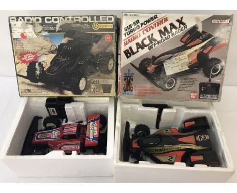 2 boxed vintage battery operated remote control off-road racer cars. A Digitcon, Hitari Turbo King in red, scale 1/16. Togeth