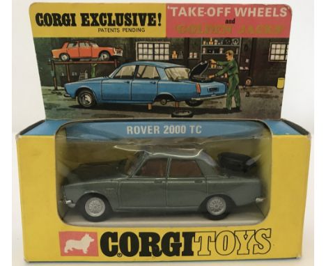 A 1970's Corgi "Take-Off-Wheels" and "Golden Jacks" Rover 2000 TC in original packaging. Creasing to plastic packaging and sc