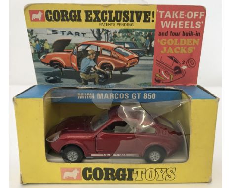 A 1968 Corgi "Take-Of-Wheels" and four built in "Golden Jacks" Mini Marcos GT850 in original box. Car is in original conditio