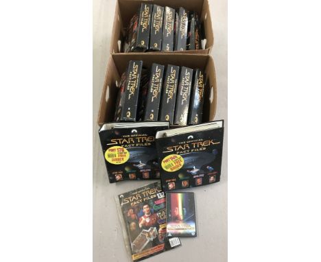 14 Star Trek Official Fact Files ring binder folders containing collector's magazines. Together with Star Trek The Motion Pi