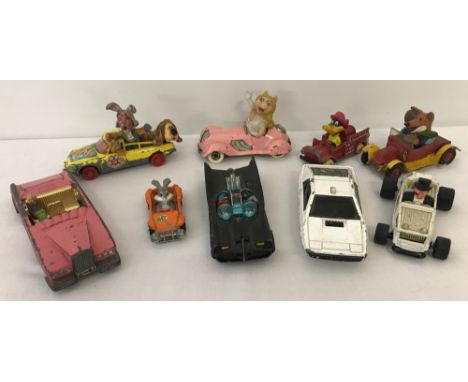 A collection of Corgi, Ertl and Dinky TV and film character vehicles. Comprising Miss Piggy, Daffy Duck, Penguin from Batman,