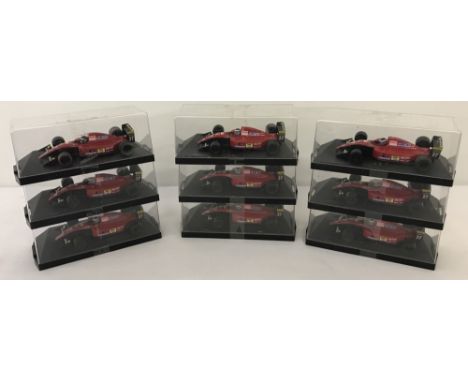 9 cased models of the 1992 F1 #27 Ferrari racing cars by Onyx.