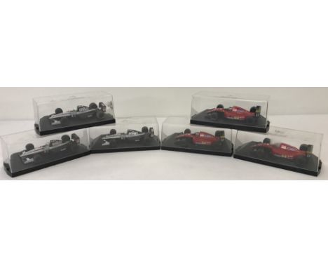 6 cased F1 model racing cars by Onyx. Three Honda Tyrell and 3 Ferrari.