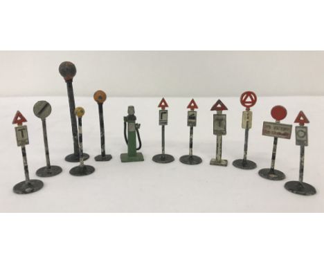 A collection of pre war, mostly Dinky Toys, road signs and accessories. To include: 49a Bowser Petrol pump, 47s Crossing No G