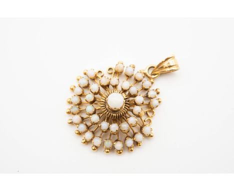 A 14ct GOLD AND OPAL PENDANT, centred by an opal bead within twin bands of radiating arms each with opal bead terminal, with 