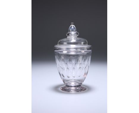 AN 18TH CENTURY GLASS CADDY, the cover with acorn knop, the body with slice-cut panels. 14cmGood condition.