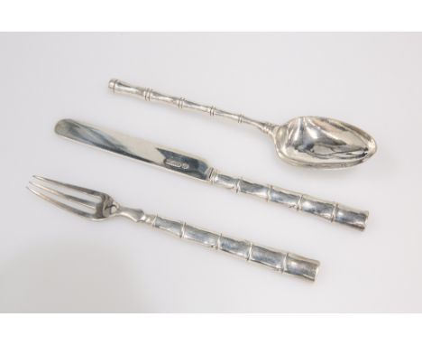 AN EDWARDIAN SILVER THREE PIECE CHRISTENING SET WITH "BAMBOO" HANDLES, WILLIAM HUTTON &amp; SONS LTD., SHEFFIELD 1903, the kn