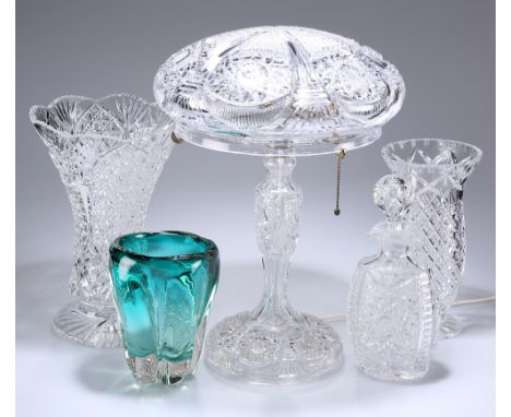 A GROUP OF GLASS, comprising&nbsp;a cut-glass mushroom lamp, two cut-glass vases, cut-glass decanter and a mid-Century green 