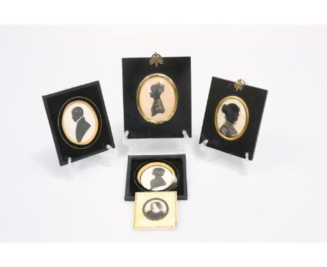 A GROUP OF FOUR PORTRAIT SILHOUETTES, 19th CENTURY AND LATER, one reverse-printed on glass of a lady in a high lace collar, a