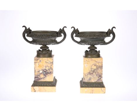 A PAIR OF 19TH CENTURY SIENNA MARBLE AND BRONZE URNS, IN THE NEO-CLASSICAL STYLE, with saucer-shaped beaded and leaf-cast rim