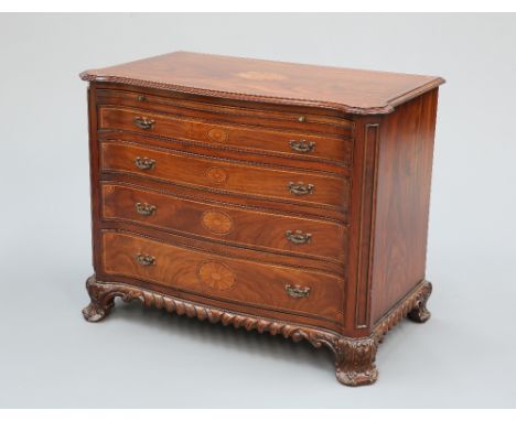 A HANDSOME GEORGE III STYLE TEAK SERPENTINE DRESSING COMMODE, the string-inlaid moulded top with canted corners and centred b
