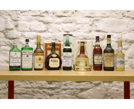 9 BOTTLES MIXED LOT ASSORTED SPIRITS (including Malt Whisky, Rum, Gin and Calvados) comprising: 1 bottle Laphroaig Islay Malt