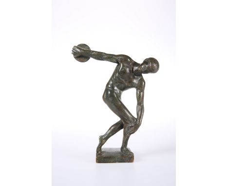 AFTER THE ANTIQUE, A BRONZE FIGURE OF A DISCUS THROWER, with green patina. 18.5cm