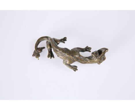 AN UNUSUAL BRONZE OF A DRAGON, with up-twisted head, 19th Century. 19.5cm