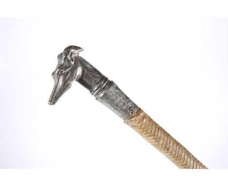 A LATE 19th CENTURY HOUND'S HEAD LADY'S CARRIAGE WHIP, the silver plated terminal finely modelled and engraved as a dog's hea