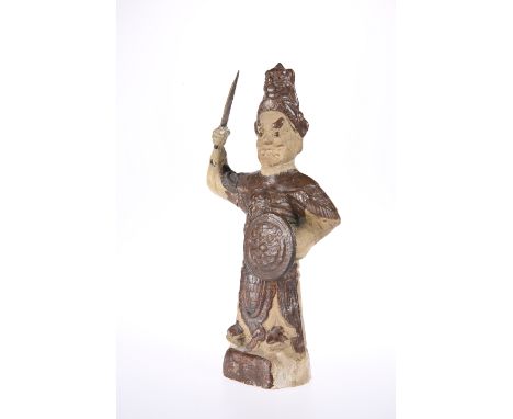 A CHINESE EARTHENWARE FIGURE, the hollow figure modelled holding a shield and sword, impressed characters verso, 30cm; togeth