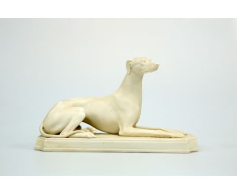A COPELAND PARIAN MODEL OF A GREYHOUND, last quarter of 19th Century, modelled with paws straight-out, the rectangular base w