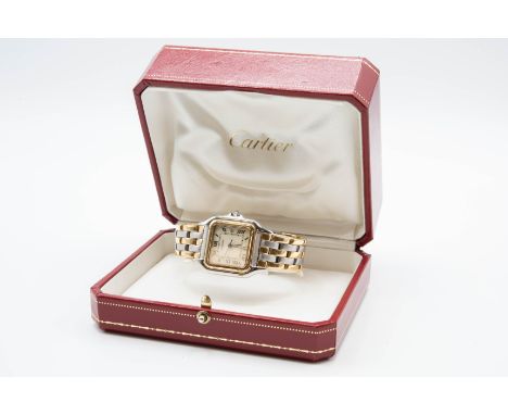 A CARTIER BI-COLOUR PANTHERE BRACELET WATCH. Square ivory dial with roman index, central seconds hand, date window at 3 o'clo