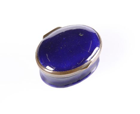A BILSTON BLUE COBALT ENAMEL PATCH BOX, 18TH CENTURY, oval, the hinged lid with mirror to the underside. 4.3cm wide