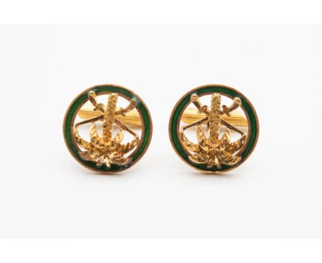 A PAIR OF 18CT YELLOW GOLD AND ENAMEL CUFFLINKS, the circular mount with delicate green enamelling inset with palm tree and c